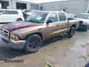 2001 Dodge Dakota Sport with VIN 1B7GL2AN71S217191, listed as a IAAI auction lot 43326836 with 294,901 mi miles and . Bid and sale history available at DreamBid. Image 2.
