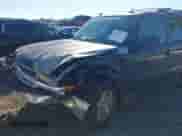 2005 Chevrolet Tahoe LT z VIN 1GNEC13T85J201856, wystawiony jako IAAI lot #41099372 z przebiegiem 303 169 mil mil oraz . Historia ofert i sprzedaży dostępna na DreamBid. Obrazek 6.