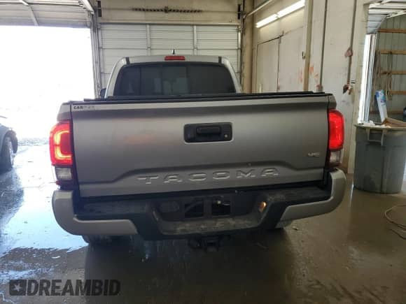 2018 Toyota Tacoma SR5 with VIN 5TFRZ5CN5JX066473, listed as a Copart auction lot 50875405 with 55,391 mi miles and Salvage title. Bid and sale history available at DreamBid. Image 6.