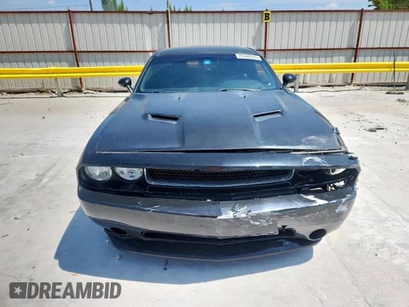 2013 Dodge Challenger SXT с VIN 2C3CDYAG5DH704373, выставлен на аукционе Copart как лот 70580635 с пробегом 113 104 миль миль и Списание • Salvage title. История ставок и продаж доступна на DreamBid. Изображение 5.