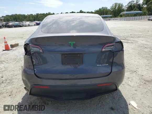 2022 Tesla Model Y Long Range с VIN 7SAYGAEE2NF382147, выставлен на аукционе Copart как лот 69842725 с пробегом 58 197 миль миль и Списание • Salvage title. История ставок и продаж доступна на DreamBid. Изображение 6.