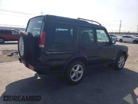 2002 Land Rover Discovery Cloth with VIN SALTY15432A759013, listed as a Copart auction lot 51176345 with 86,996 mi miles and Salvage title. Bid and sale history available at DreamBid. Image 3.