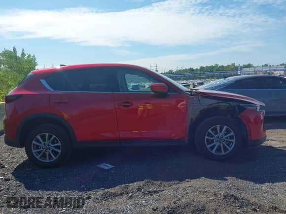 2023 Mazda CX-5 S Select z VIN JM3KFBBM1P0219263, wystawiony jako IAAI lot #43061540 z przebiegiem 10 019 mil mil oraz . Historia ofert i sprzedaży dostępna na DreamBid. Obrazek 13.