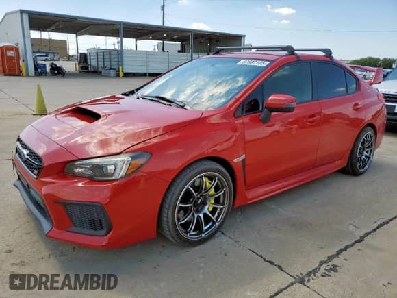 2018 Subaru WRX STI с VIN JF1VA2M63J9830424, выставлен на аукционе Copart как лот 67687105 с пробегом 75 294 миль миль и Списание • Salvage title. История ставок и продаж доступна на DreamBid. Изображение 1.