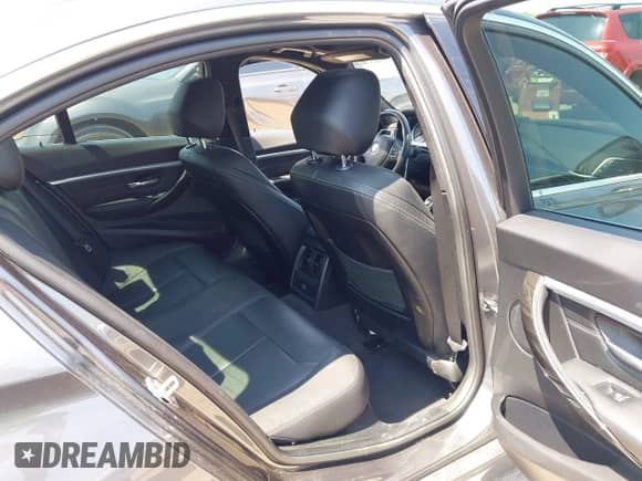 2018 BMW 3 Series 330i with VIN WBA8B9C57JK676862, listed as a IAAI auction lot 43159659 with 94,758 mi miles and . Bid and sale history available at DreamBid. Image 8.