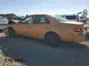 2000 Toyota Camry LE z VIN 4T1BF22K5YU105764, wystawiony jako Copart lot #82316665 z przebiegiem 126 289 mil mil oraz Szkoda całkowita • Salvage title. Historia ofert i sprzedaży dostępna na DreamBid. Obrazek 2.