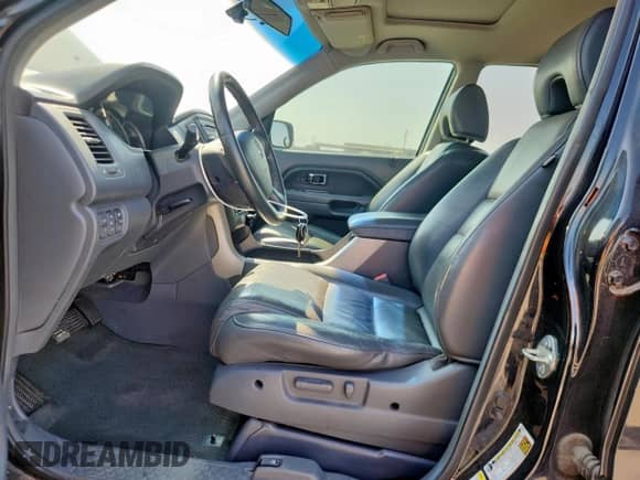 2006 Honda Pilot EX-L z VIN 5FNYF28506B048699, wystawiony jako Copart lot #71624605 z przebiegiem 187 755 mil mil oraz Czysty tytuł • Clean title. Historia ofert i sprzedaży dostępna na DreamBid. Obrazek 7.