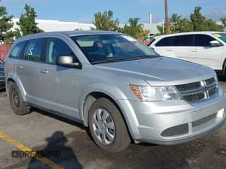 2014 Dodge Journey American Value with VIN 3C4PDCAB3ET241677, listed as a IAAI auction lot 43508874 with 167,198 mi miles and . Bid and sale history available at DreamBid. Image 1.