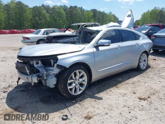 2018 Chevrolet Impala Premier with VIN 2G1125S33J9136125, listed as a IAAI auction lot 42012548 with 151,731 mi miles and . Bid and sale history available at DreamBid. Image 2.