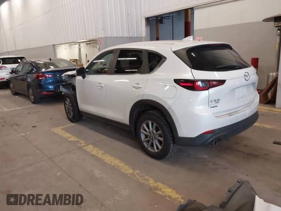2023 Mazda CX-5 S Preferred z VIN JM3KFBCM4P0240168, wystawiony jako IAAI lot #41979846 z przebiegiem 38 648 mil mil oraz . Historia ofert i sprzedaży dostępna na DreamBid. Obrazek 3.