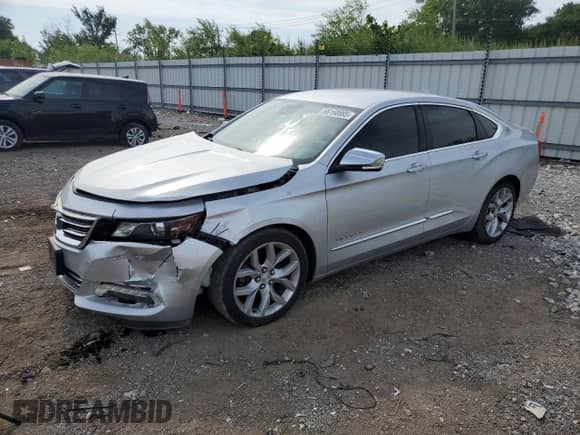 2015 Chevrolet Impala LTZ with VIN 2G1155SL9F9132871, listed as a Copart auction lot 66160885 with 121,788 mi miles and Salvage title. Bid and sale history available at DreamBid. Image 1.