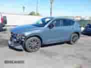 2022 Mazda CX-5 S Preferred z VIN JM3KFBCM2N1565165, wystawiony jako IAAI lot #42507203 z przebiegiem 39 853 mil mil oraz . Historia ofert i sprzedaży dostępna na DreamBid. Obrazek 15.