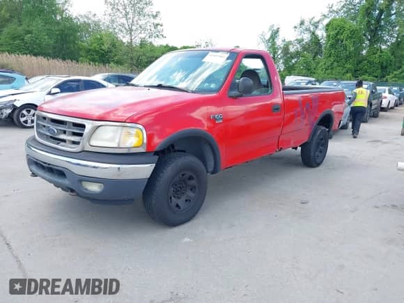 2000 Ford F-150 XL with VIN 1FTPF18LXYNA72484, listed as a IAAI auction lot 42187405 with 233,334 mi miles and . Bid and sale history available at DreamBid. Image 2.