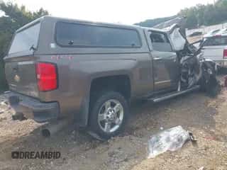 2015 Chevrolet Silverado 2500HD High Country с VIN 1GC1KXE8XFF614341, выставлен на аукционе IAAI как лот 43154911 с пробегом Не указан миль и . История ставок и продаж доступна на DreamBid. Изображение 4.