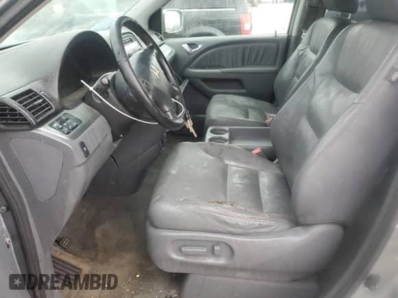 2007 Honda Odyssey EX-L z VIN 5FNRL38607B106646, wystawiony jako Copart lot #80449315 z przebiegiem 278 242 mil mil oraz Szkoda całkowita • Salvage title. Historia ofert i sprzedaży dostępna na DreamBid. Obrazek 7.