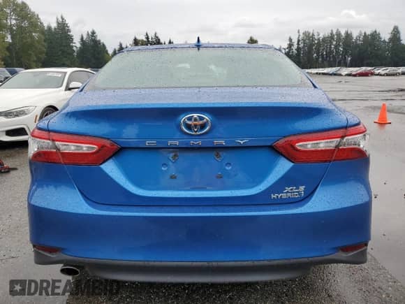 2019 Toyota Camry Hybrid LE с VIN 4T1B21HK9KU010337, выставлен на аукционе Copart как лот 84294555 с пробегом 35 132 миль миль и Списание • Salvage title. История ставок и продаж доступна на DreamBid. Изображение 6.