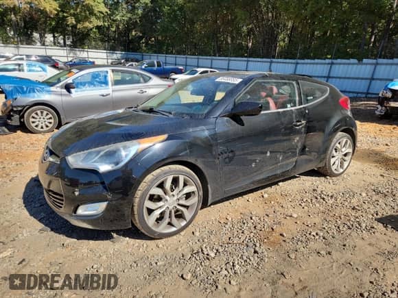 2012 Hyundai Veloster w/Black Int z VIN KMHTC6AD4CU032645, wystawiony jako Copart lot #86488855 z przebiegiem 90 307 mil mil oraz Szkoda całkowita • Salvage title. Historia ofert i sprzedaży dostępna na DreamBid. Obrazek 1.