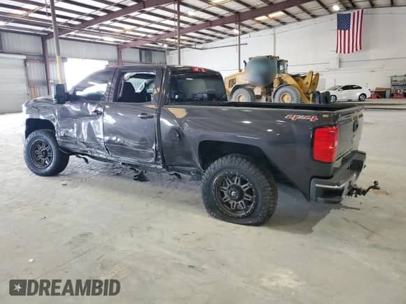2016 Chevrolet Silverado 2500HD LT with VIN 1GC1KVE82GF155294, listed as a Copart auction lot 65404655 with 124,699 mi miles and Salvage title. Bid and sale history available at DreamBid. Image 2.
