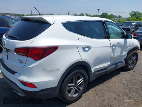 2018 Hyundai Santa Fe 2.4L с VIN 5XYZTDLB0JG563984, выставлен на аукционе IAAI как лот 42492382 с пробегом 57 832 миль миль и . История ставок и продаж доступна на DreamBid. Изображение 4.