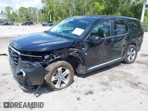 2024 Honda Pilot EX-L with VIN 5FNYG2H49RB014141, listed as a IAAI auction lot 42013162 with 13,351 mi miles and . Bid and sale history available at DreamBid. Image 18.