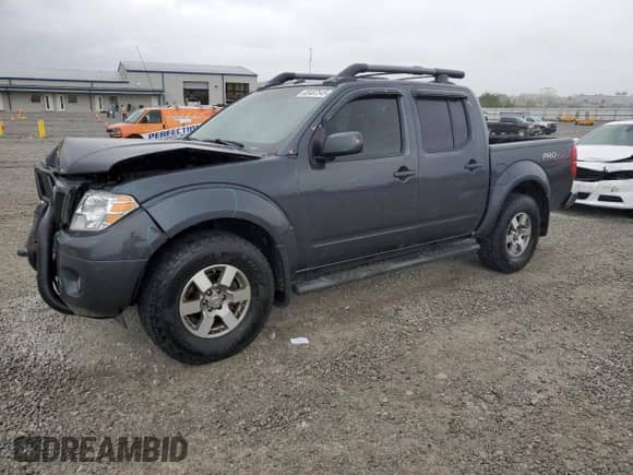 2011 Nissan Frontier Pro-4X with VIN 1N6AD0EV3BC448597, listed as a Copart auction lot 85487545 with 178,348 mi miles and Salvage title. Bid and sale history available at DreamBid. Image 1.