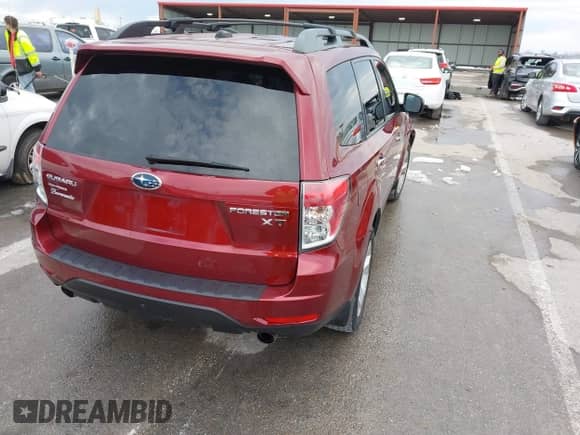 2012 Subaru Forester XT Premium z VIN JF2SHGAC2CH468578, wystawiony jako IAAI lot #41315950 z przebiegiem 213 860 mil mil oraz . Historia ofert i sprzedaży dostępna na DreamBid. Obrazek 4.