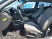 2012 Hyundai Veloster w/Black Int z VIN KMHTC6AD1CU037673, wystawiony jako Copart lot #71550475 z przebiegiem 204 000 mil mil oraz Szkoda całkowita • Salvage title. Historia ofert i sprzedaży dostępna na DreamBid. Obrazek 7.