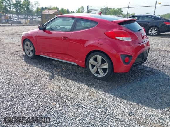 2013 Hyundai Veloster Turbo с VIN KMHTC6AE6DU146902, выставлен на аукционе IAAI как лот 42276203 с пробегом 117 752 миль миль и . История ставок и продаж доступна на DreamBid. Изображение 3.