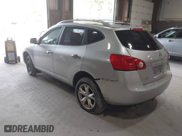 2010 Nissan Rogue S with VIN JN8AS5MV2AW112755, listed as a IAAI auction lot 43276874 with 230,663 mi miles and . Bid and sale history available at DreamBid. Image 3.