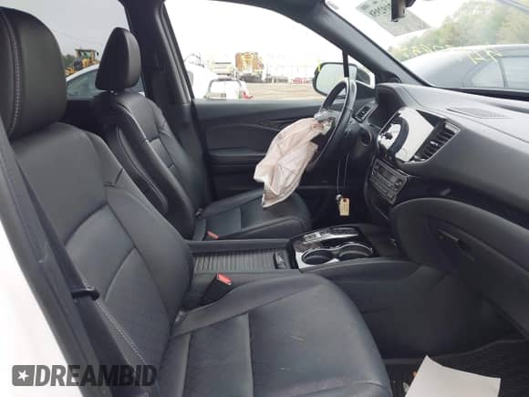 2023 Honda Passport Elite z VIN 5FNYF8H00PB022743, wystawiony jako IAAI lot #42192958 z przebiegiem 25 165 mil mil oraz . Historia ofert i sprzedaży dostępna na DreamBid. Obrazek 5.