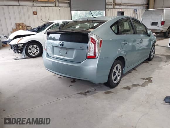 2014 Toyota Prius Four with VIN JTDKN3DUXE1829748, listed as a IAAI auction lot 42908535 with 126,116 mi miles and . Bid and sale history available at DreamBid. Image 4.