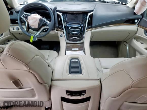 2020 Cadillac Escalade Premium Luxury с VIN 1GYS4CKJ0LR243080, выставлен на аукционе Copart как лот 68518165 с пробегом 88 399 миль миль и Списание • Salvage title. История ставок и продаж доступна на DreamBid. Изображение 8.