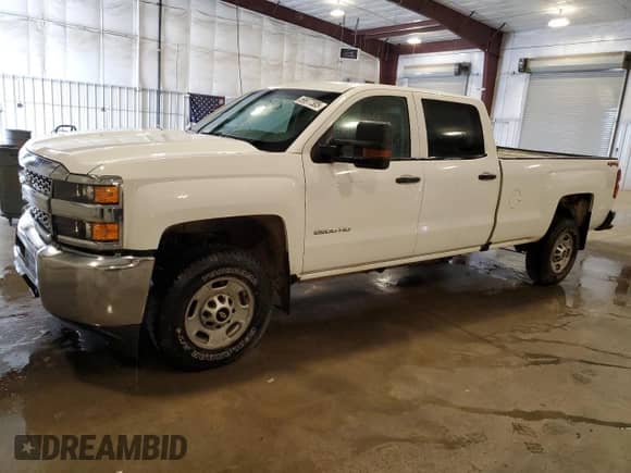 2019 Chevrolet Silverado 2500HD Work Truck z VIN 1GC1KREG6KF138117, wystawiony jako Copart lot #59977305 z przebiegiem 115 398 mil mil oraz Szkoda całkowita • Salvage title. Historia ofert i sprzedaży dostępna na DreamBid. Obrazek 1.