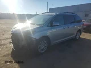2016 Toyota Sienna XLE with VIN 5TDYK3DCXGS748698, listed as a Copart auction lot 84625385 with 93,932 mi miles and Salvage title. Bid and sale history available at DreamBid. Image 1.