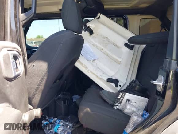 2023 Jeep Wrangler Sport S with VIN 1C4HJXDG7PW617662, listed as a IAAI auction lot 42725503 with Not provided miles and . Bid and sale history available at DreamBid. Image 8.