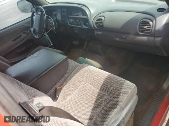 1999 Dodge 1500 z VIN 1B7HC13Z5XJ518264, wystawiony jako Copart lot #64565104 z przebiegiem 178 919 mil mil oraz Szkoda całkowita • Salvage title. Historia ofert i sprzedaży dostępna na DreamBid. Obrazek 8.