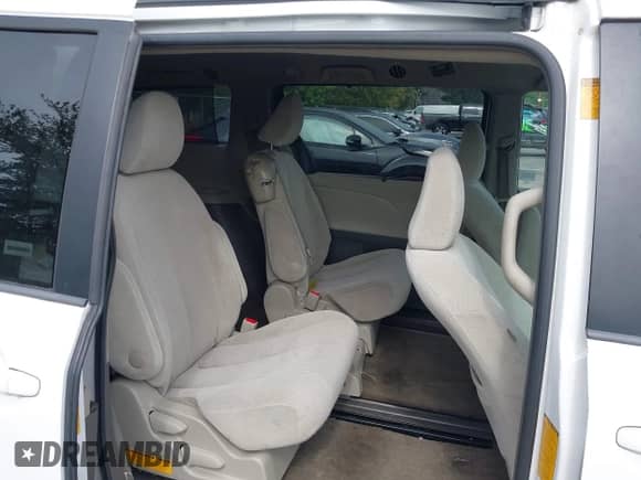 2013 Toyota Sienna LE AAS with VIN 5TDKK3DC3DS308565, listed as a IAAI auction lot 43281154 with 221,342 mi miles and . Bid and sale history available at DreamBid. Image 8.