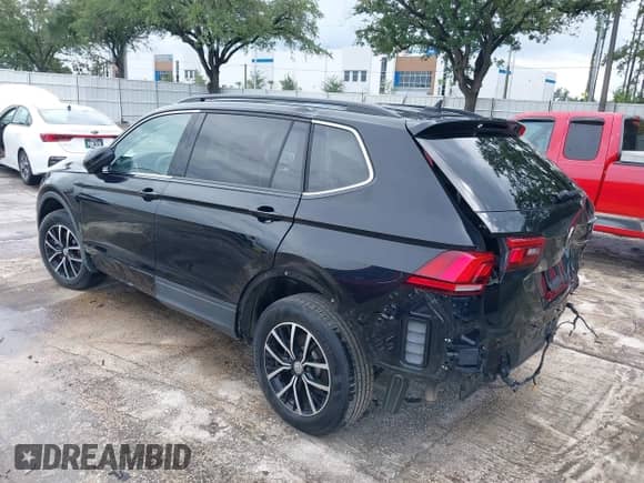 2021 Volkswagen Tiguan SE с VIN 3VV2B7AXXMM058256, выставлен на аукционе IAAI как лот 43250700 с пробегом 33 409 миль миль и . История ставок и продаж доступна на DreamBid. Изображение 3.
