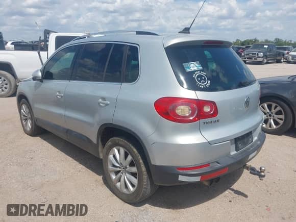 2011 Volkswagen Tiguan S with VIN WVGAV7AX1BW555710, listed as a IAAI auction lot 43025250 with 174,370 mi miles and . Bid and sale history available at DreamBid. Image 3.