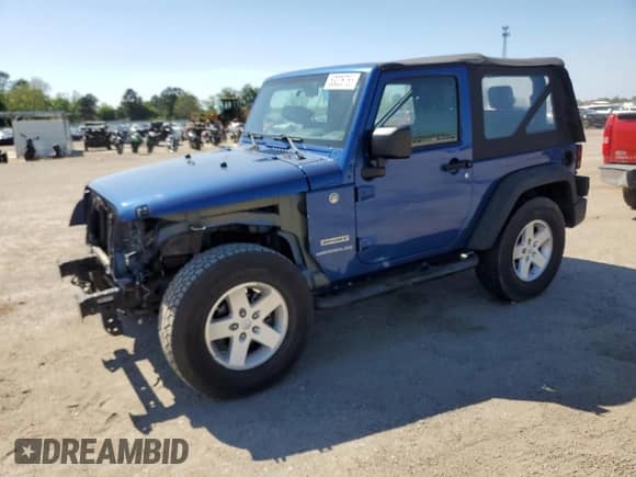 2010 Jeep Wrangler Sport z VIN 1J4AA2D12AL119064, wystawiony jako Copart lot #53026765 z przebiegiem 97 403 mil mil oraz Szkoda całkowita • Salvage title. Historia ofert i sprzedaży dostępna na DreamBid. Obrazek 1.