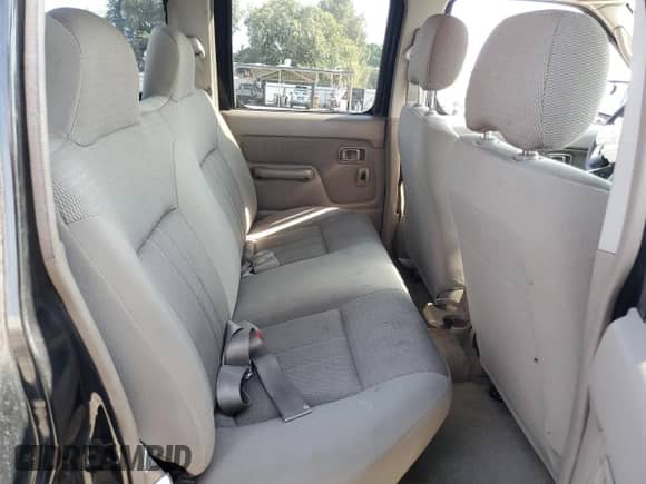 2004 Nissan Frontier XE with VIN 1N6ED27T64C477426, listed as a Copart auction lot 68329535 with 132,259 mi miles and Salvage title. Bid and sale history available at DreamBid. Image 10.