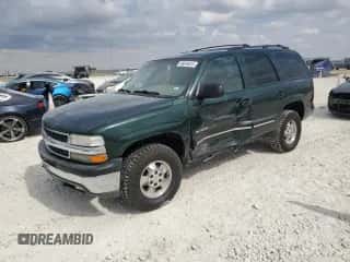 2001 Chevrolet Tahoe LT with VIN 1GNEK13T01J148132, listed as a Copart auction lot 86844615 with 309,105 mi miles and Salvage title. Bid and sale history available at DreamBid. Image 1.
