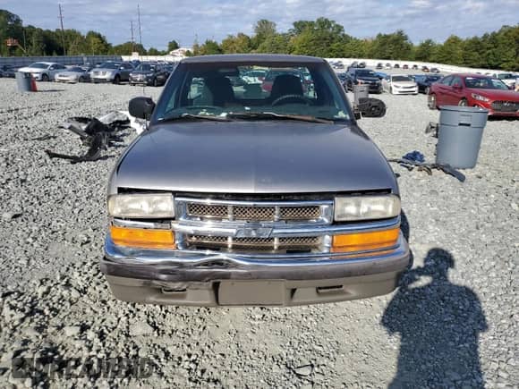 2000 Chevrolet S-10 с VIN 1GCCS1440YK109956, выставлен на аукционе Copart как лот 80080195 с пробегом 129 835 миль миль и Списание • Salvage title. История ставок и продаж доступна на DreamBid. Изображение 5.