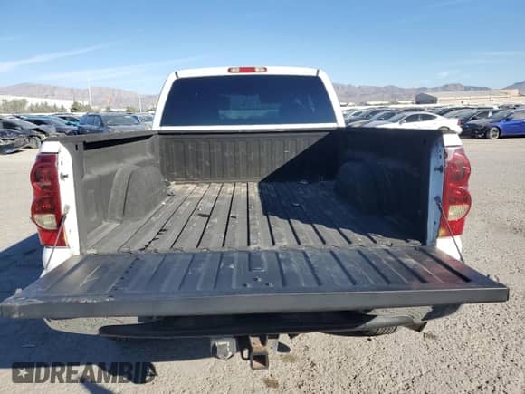 2003 Chevrolet Silverado 2500HD LS with VIN 1GCHC29U33E123116, listed as a Copart auction lot 77034944 with 225,233 mi miles and Salvage title. Bid and sale history available at DreamBid. Image 6.