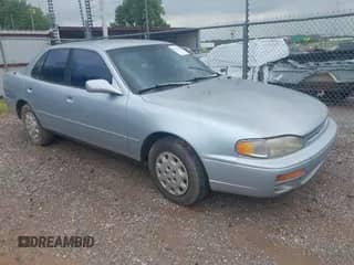 1996 Toyota Camry DX z VIN 4T1BG12K4TU734920, wystawiony jako IAAI lot #42756192 z przebiegiem 208 815 mil mil oraz . Historia ofert i sprzedaży dostępna na DreamBid. Obrazek 1.