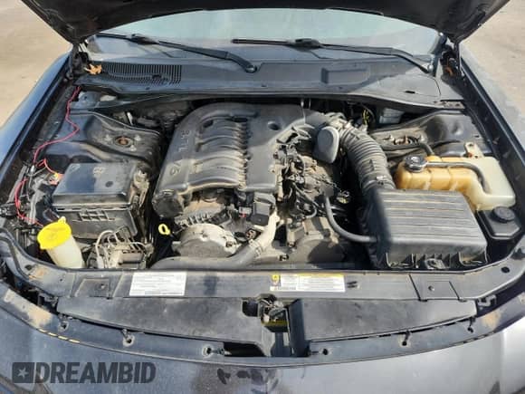 2008 Dodge Charger SXT with VIN 2B3KA33G38H309499, listed as a Copart auction lot 70401935 with 184,176 mi miles and Salvage title. Bid and sale history available at DreamBid. Image 11.