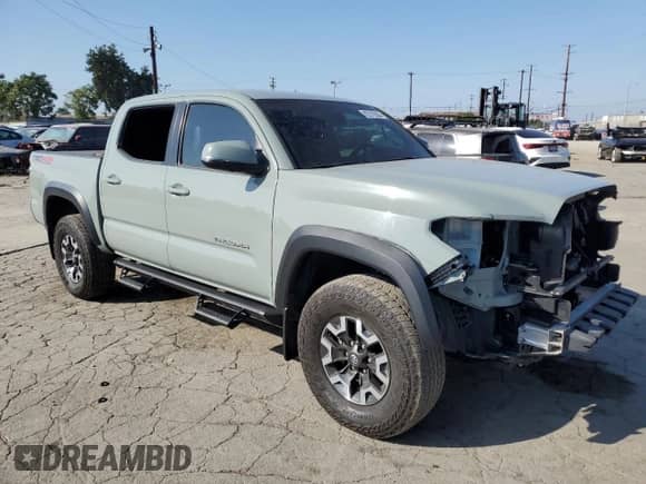 2022 Toyota Tacoma TRD Off Road с VIN 3TMCZ5AN6NM494685, выставлен на аукционе Copart как лот 82319385 с пробегом 42 267 миль миль и Списание • Salvage title. История ставок и продаж доступна на DreamBid. Изображение 4.