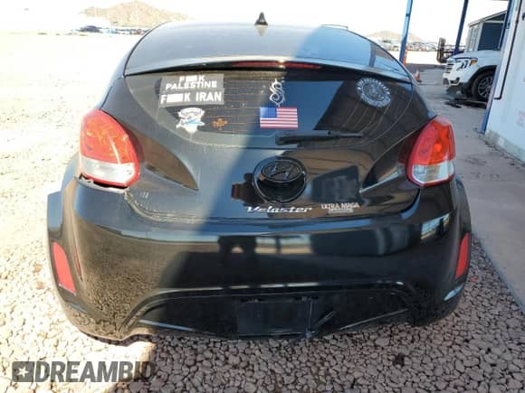 2013 Hyundai Veloster w/Black Int z VIN KMHTC6AD2DU153014, wystawiony jako Copart lot #84975285 z przebiegiem 128 446 mil mil oraz Szkoda całkowita • Salvage title. Historia ofert i sprzedaży dostępna na DreamBid. Obrazek 6.