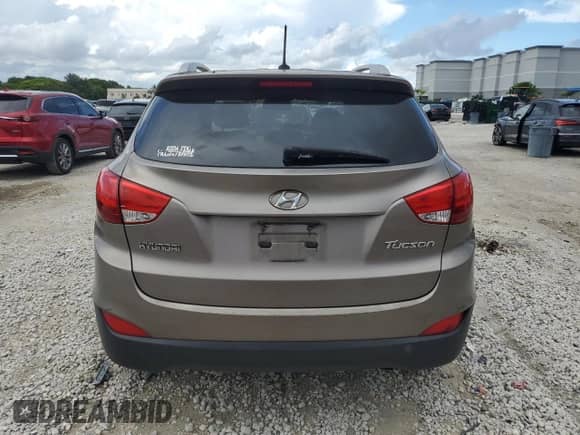 2012 Hyundai Tucson GLS z VIN KM8JU3AC6CU488866, wystawiony jako Copart lot #83814925 z przebiegiem 148 750 mil mil oraz Szkoda całkowita • Salvage title. Historia ofert i sprzedaży dostępna na DreamBid. Obrazek 6.