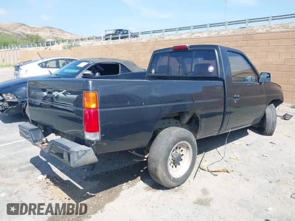 1994 Nissan Frontier with VIN 1N6SD11S2RC332033, listed as a IAAI auction lot 42105869 with 244,800 mi miles and . Bid and sale history available at DreamBid. Image 4.